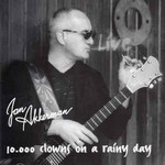 CA-Jan-Akkerman-10.000-clowns-on-a-rainy-day